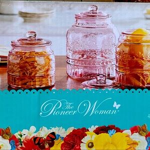 The pioneer woman set of three glass jars.